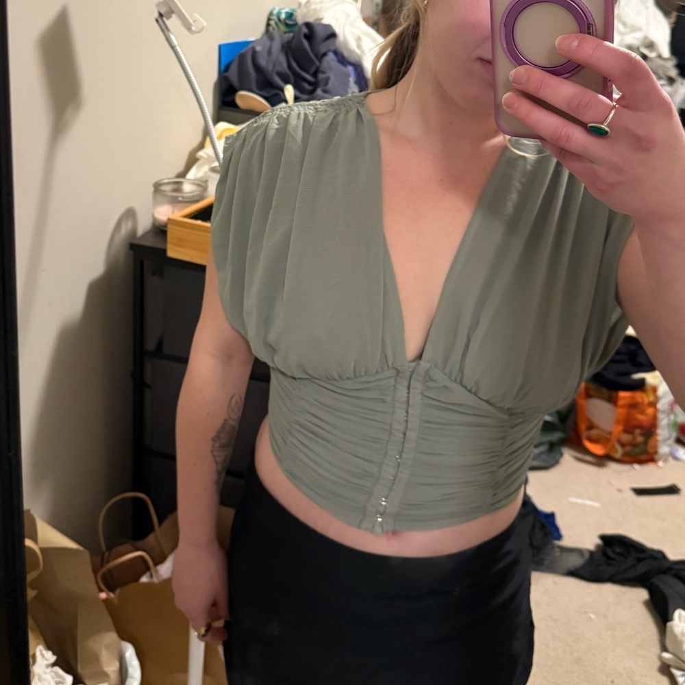 Free people sage Green stretch waist “corset” top. Open back. Worn once medium